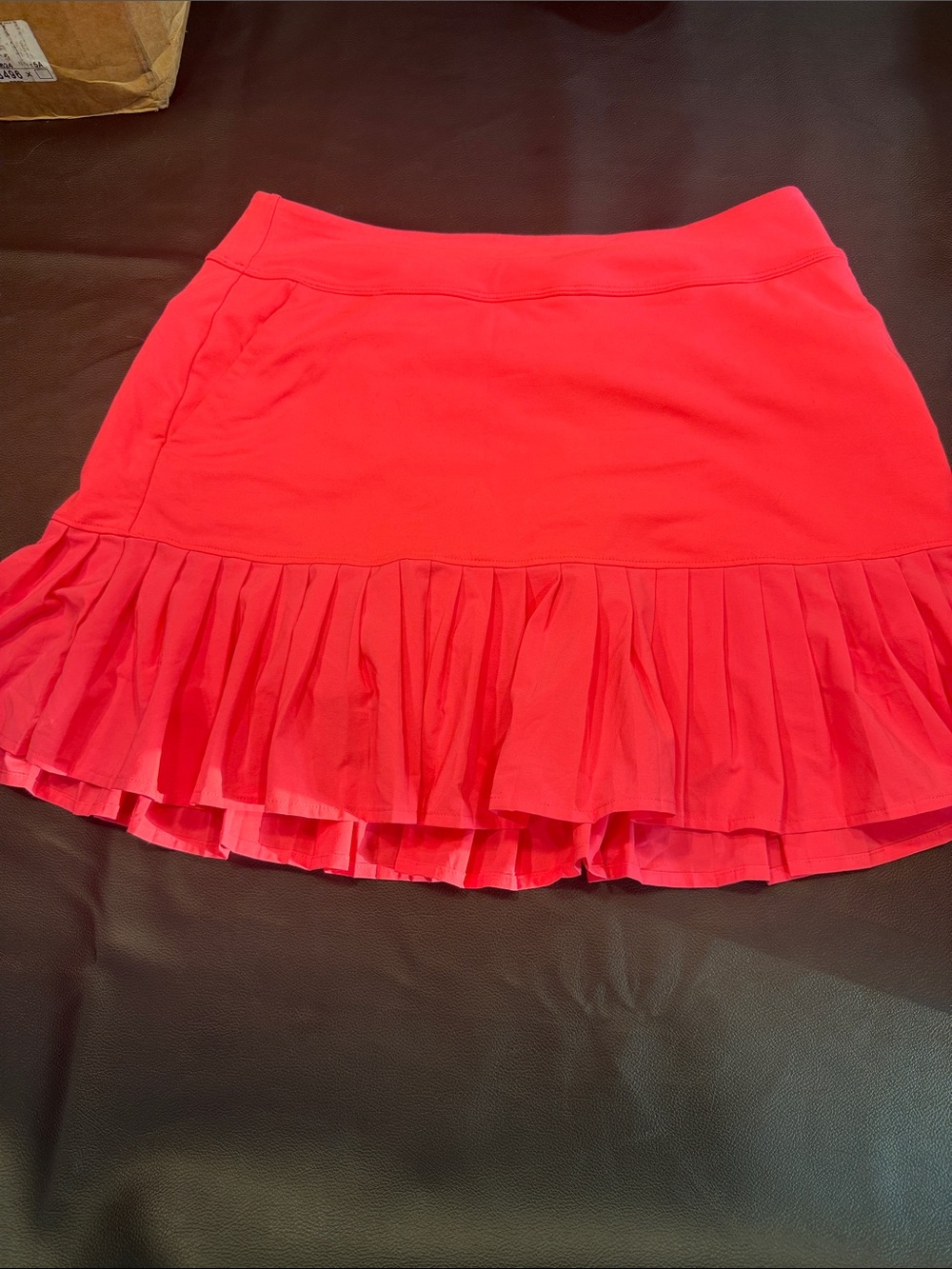 Under Armour Coral Bright Pink Pleated Hem Mini Skirt